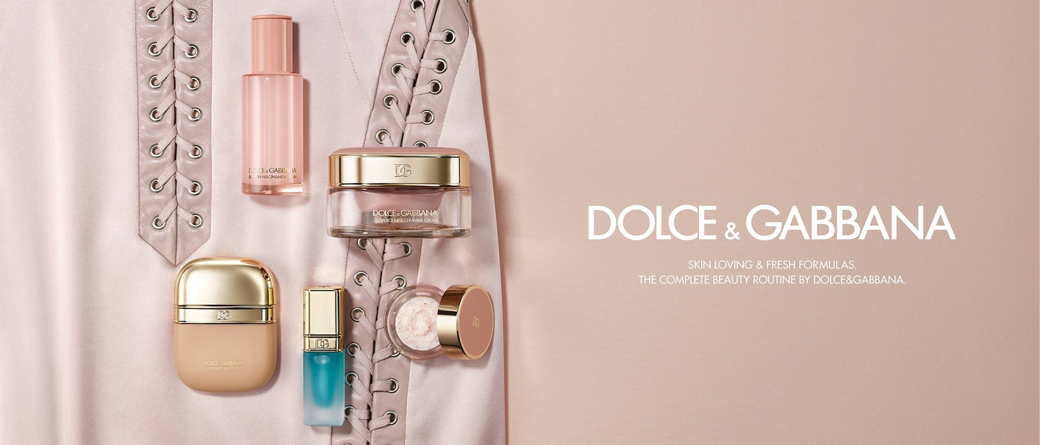 Dolce & Gabbana presents a collection of skincare essentials, featuring the Re-birth Niacinamide Serum, Blueberry Nutri-Tint, and Glow-Bounce Ceramide Cream, all designed for a complete beauty routine.