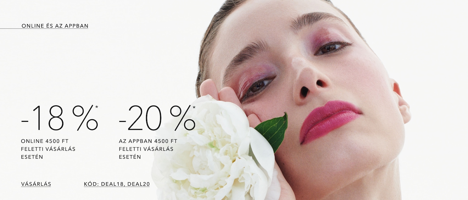 Nő virággal a kezében, rózsaszín sminkkel, akciót hirdetve: 18% kedvezmény online vásárlás esetén, 20% az appban, 4500 Ft feletti vásárlás esetén a DEAL18 és DEAL20 kódokkal.