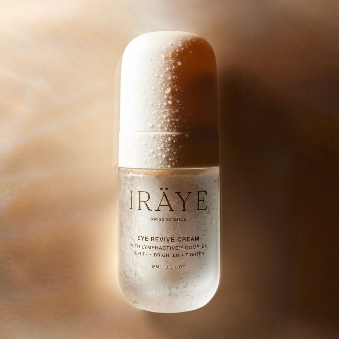 Az IRAYE Swiss Science Eye Revive Cream átlátszó és fehér tégelyben kapható, melynek célja a puffadás csökkentése, a bőr ragyogóbbá tétele és feszesítése.